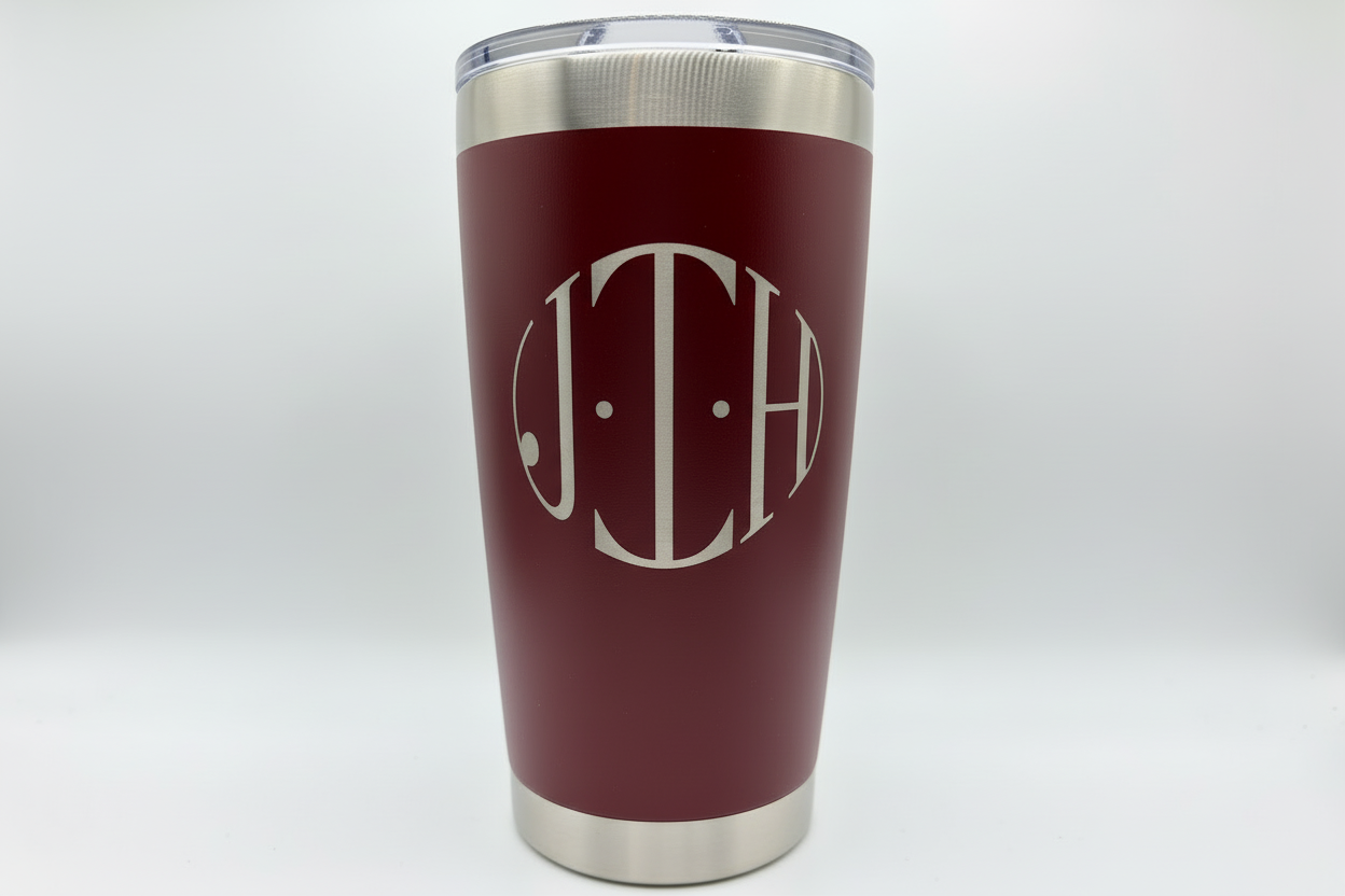 Dark red tumbler with JTH monogram