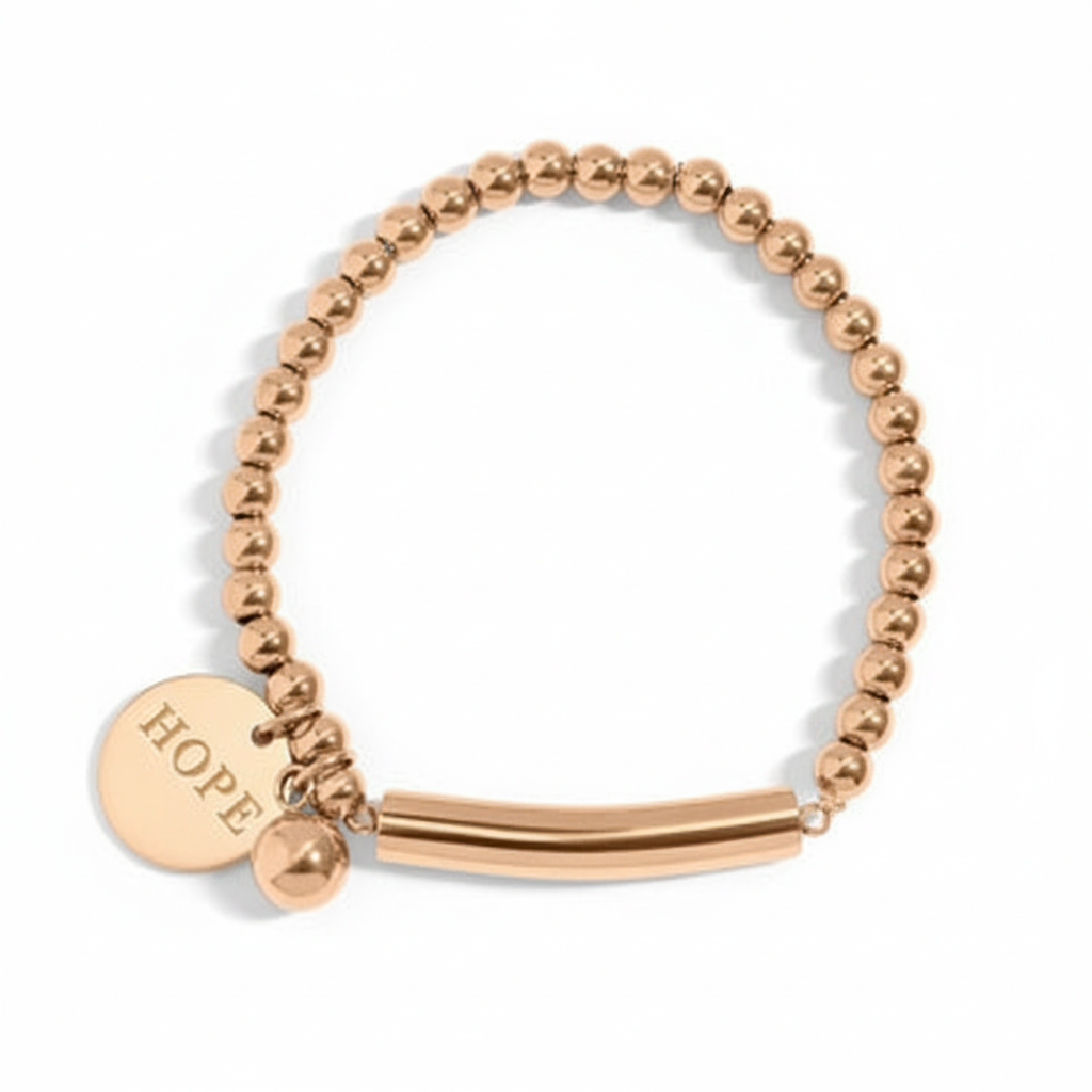 Gold beaded bracelet with HOPE engraving