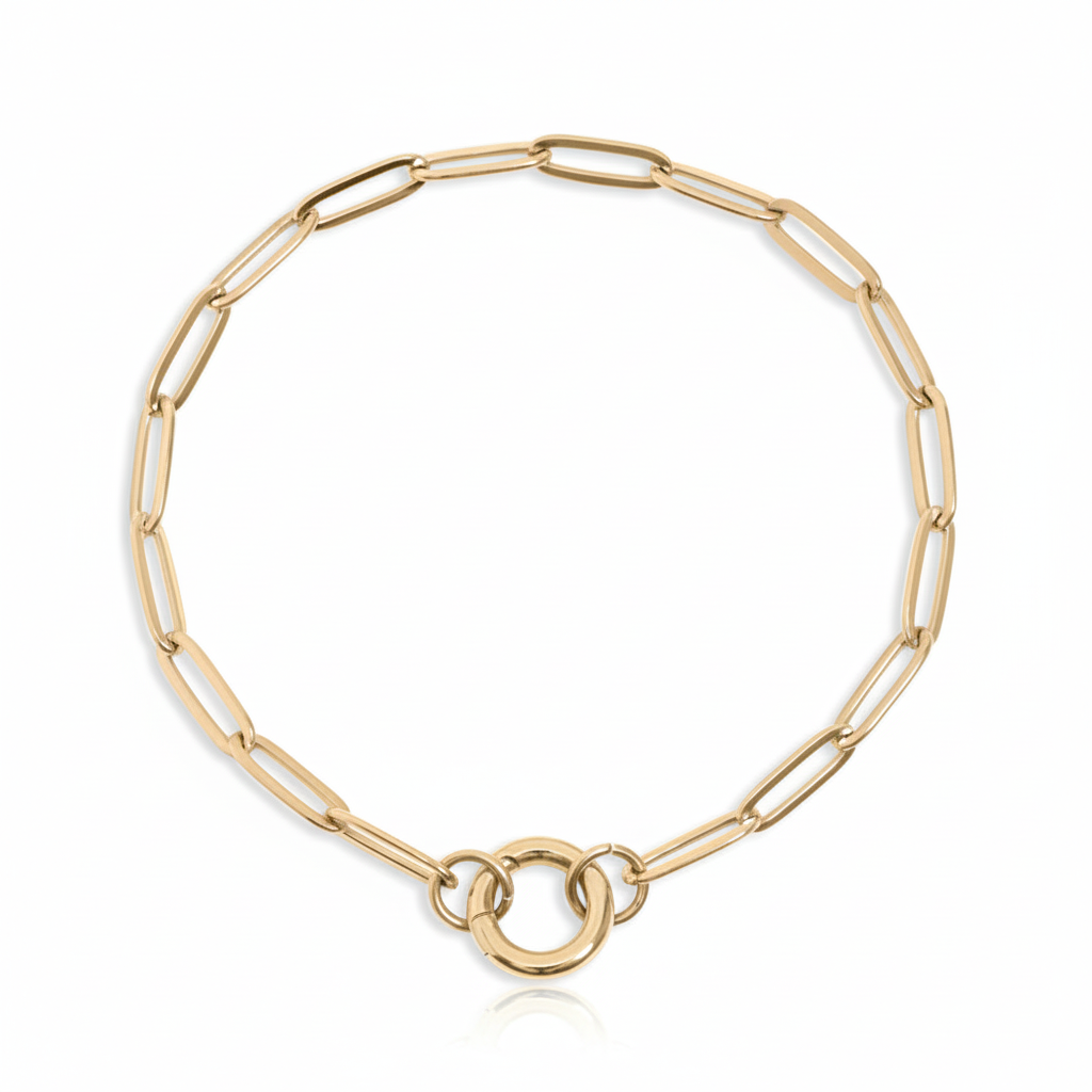 Gold chain bracelet on white background