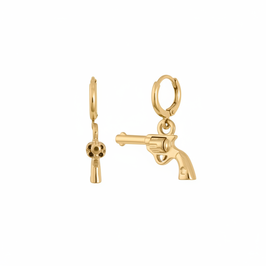 Gold revolver charm on white background
